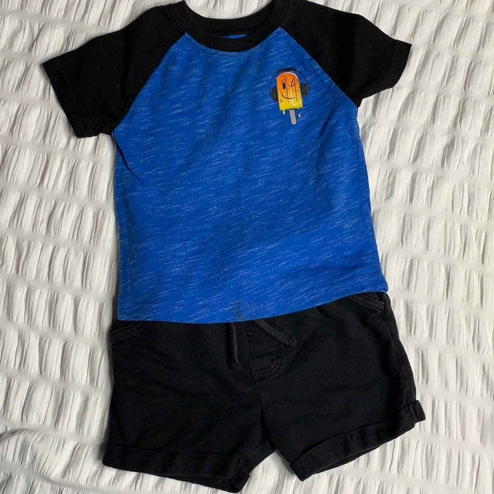 Ice cream shirt with black shorts